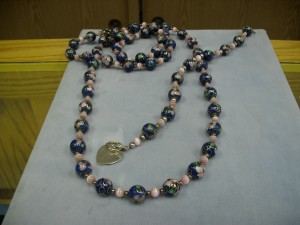 1257-  10mm round lapis color Cloisonné beads with pink catseye and sterling silver beads. Matching bracelet.  Both have an engravable heart and toggle catch.